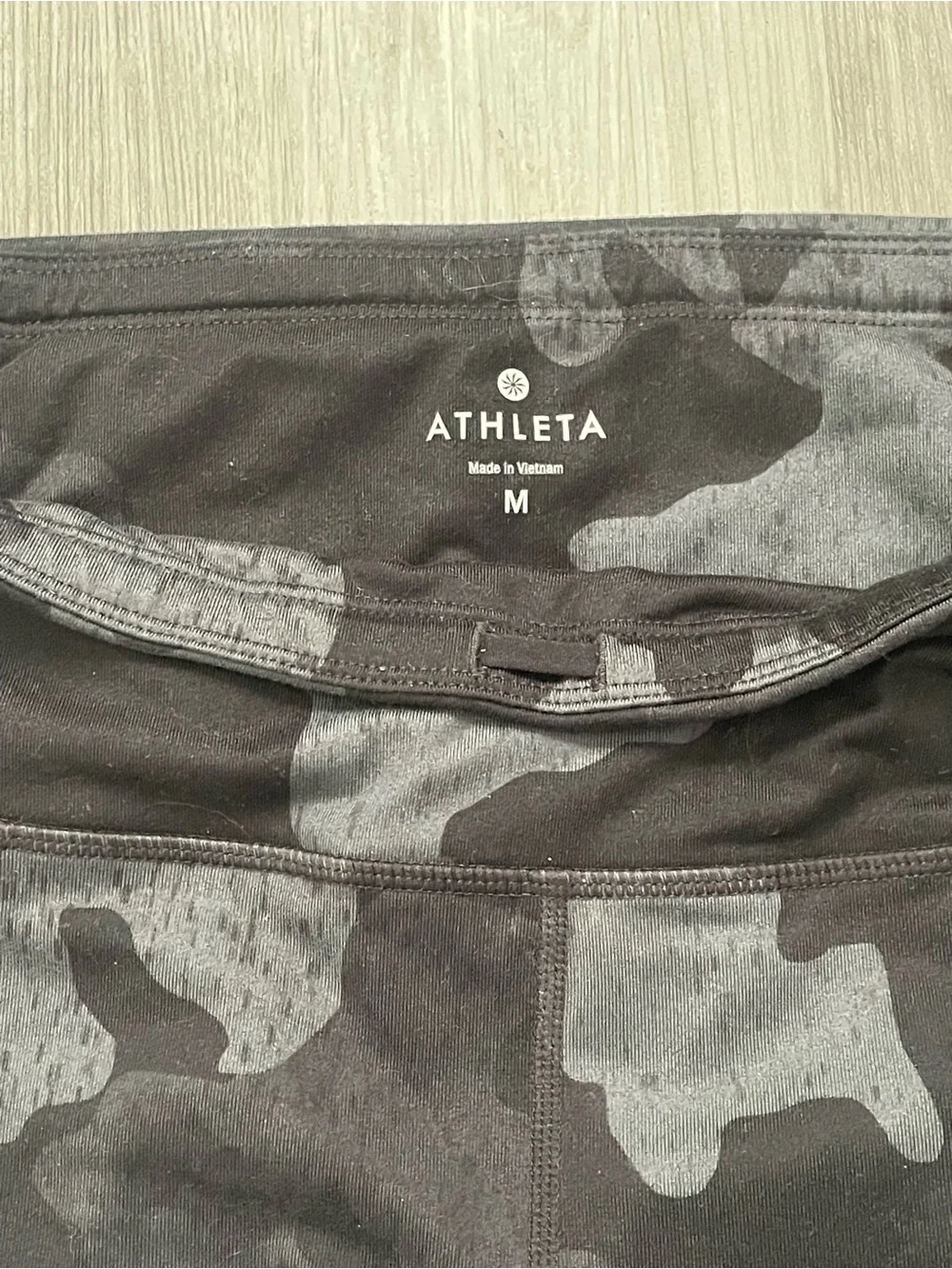 Athleta 1 black&grey camo ,capri and 2 black seize M plus 2 tank top M
